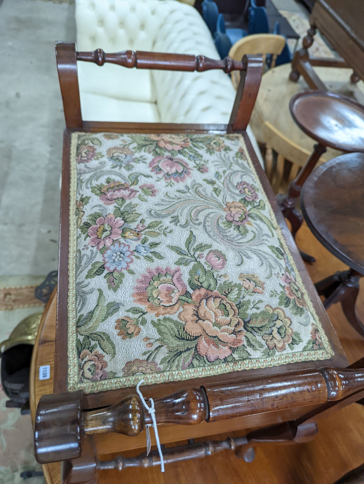 An Edwardian inlaid mahogany piano stool